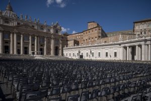 Empty chairs at St. Peter's Square depicting this strange moment in history, pandemic and need for compassion