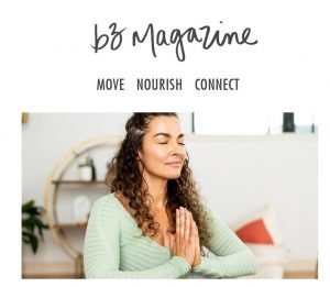 b3 magazine cover image featuring a women sitting, eyes closed, hands palms together at her chest.